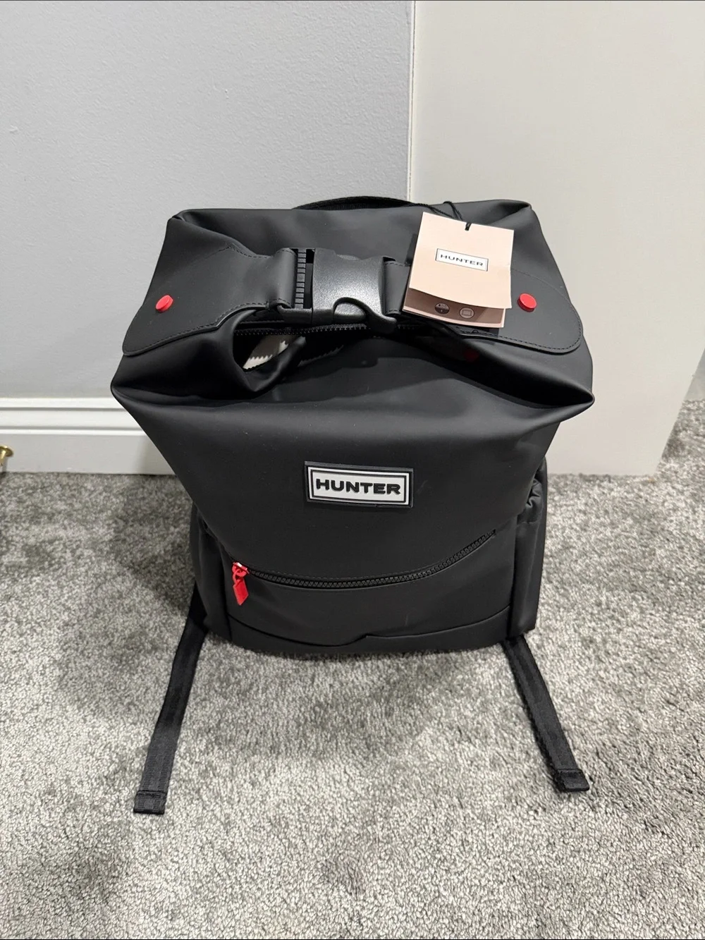 Hunter Black Roll-Top Backpack with Red Accents